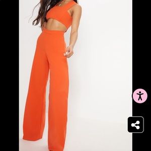 NWT Orange cut out jumpsuit